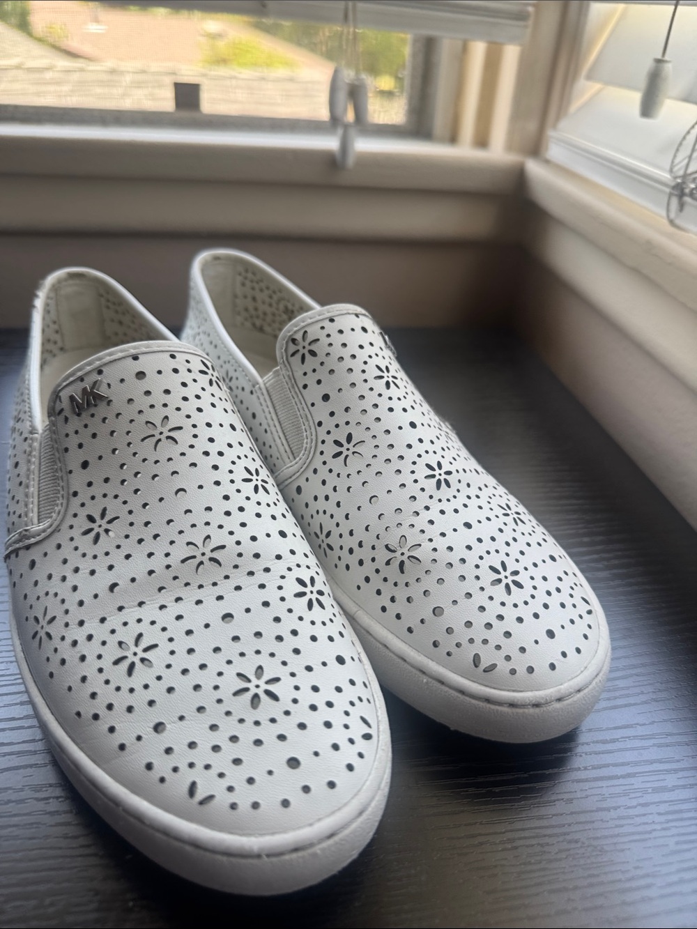 Michael Kors White Perforated Slip-On Sneakers with Floral Cutouts